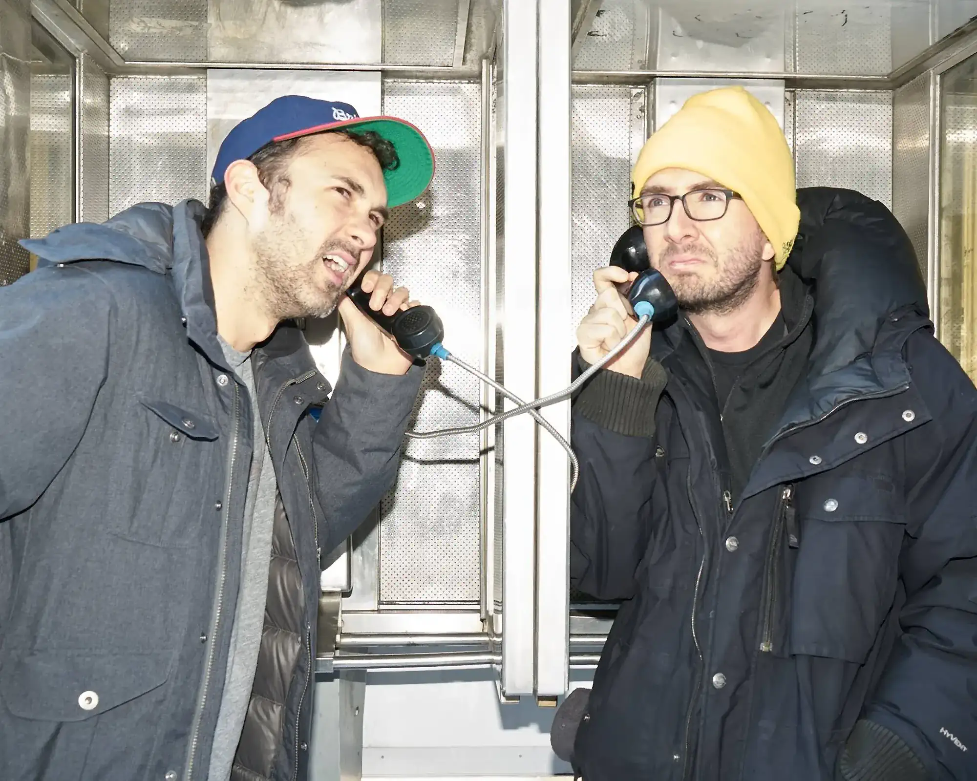 Double Telephone Booth | Mark Normand and Joe List | Tuesdays with Stories Comedians Mark Normand and Joe List of Tuesdays with Stories calling each other at a double telephone booth. Find Mark Normand Tour Dates and Joe List Tour Dates at www.tuesdayspod.com/find-a-show