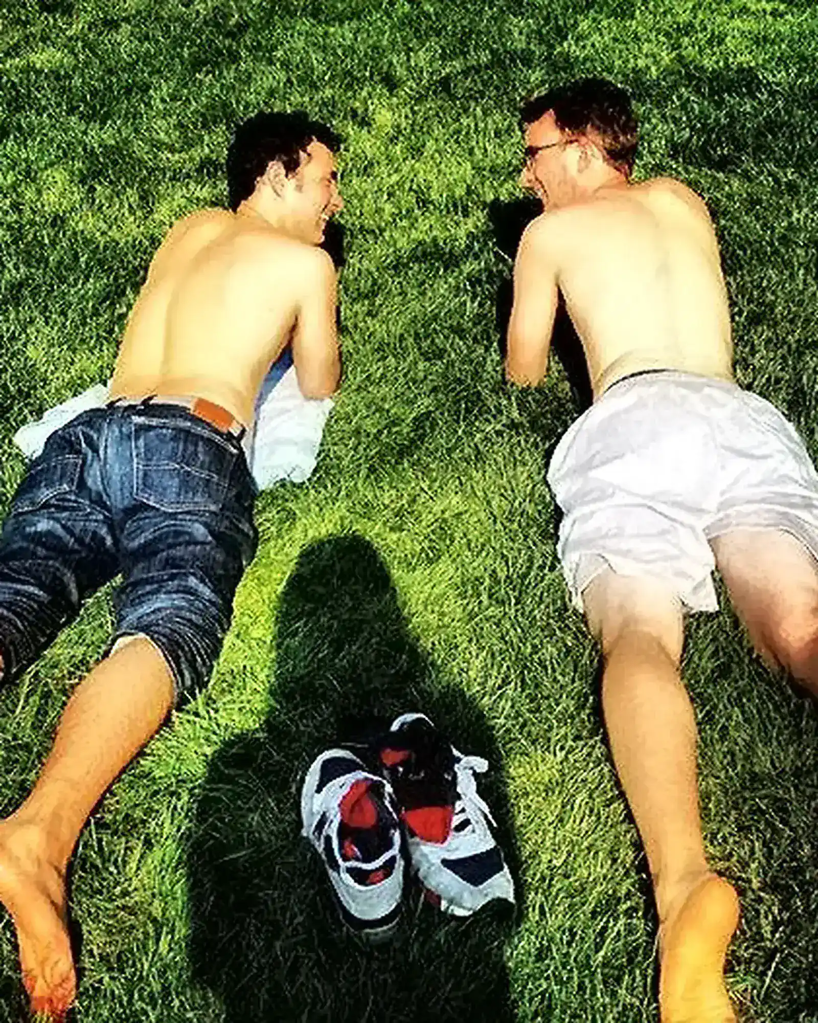 Shirtless, Feet Out, Sunbathing in Jeans | Mark Normand and Joe List | Tuesdays with Stories Comedians Mark Normand and Joe List of Tuesdays with Stories sunbathing on the grass, shirtless. Find Mark Normand Tour Dates and Joe List Tour Dates at www.tuesdayspod.com/find-a-show