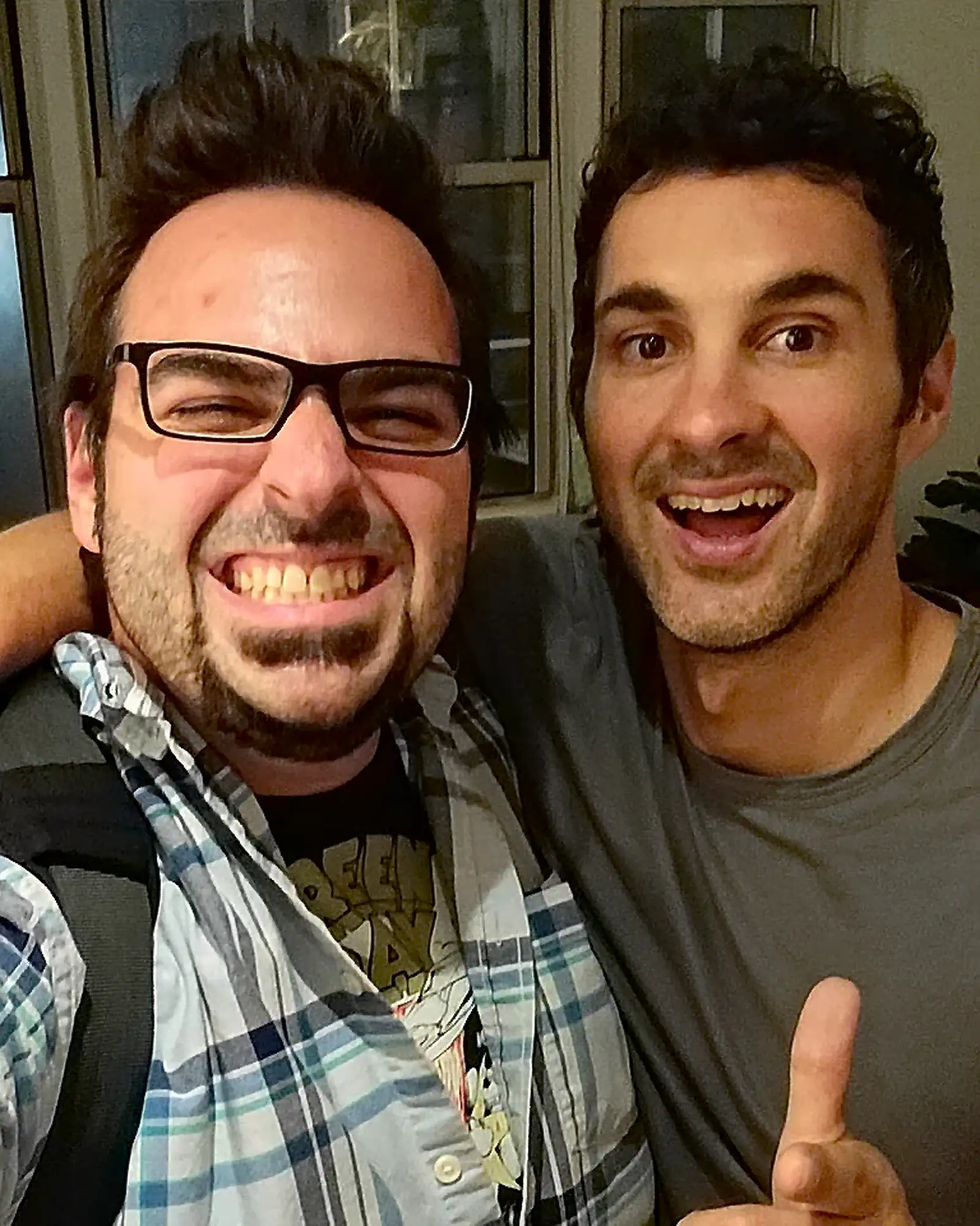 Thumbs up with Chuck Staton in a Greenday Shirt | Mark Normand | Tuesdays with Stories Producer Chuck Staton of Tuesdays with Stories giving thumbs up in a Greenday shirt with Comedian Mark Normand of Tuesdays with Stories. Find more Tuesdays with Stories photos at www.tuesdayspod.com/photos