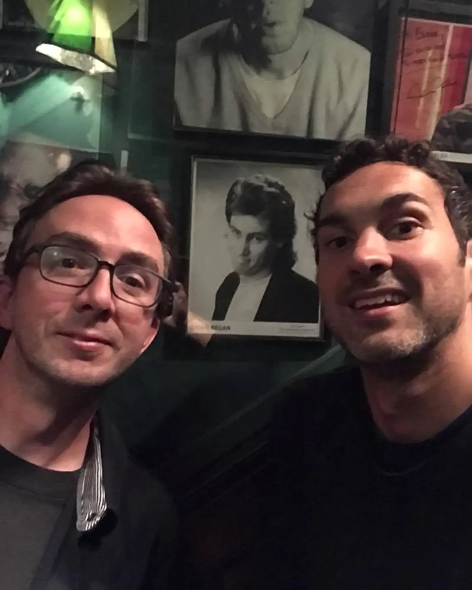Young Brian Regan Photo Selfie | Mark Normand and Joe List | Tuesdays with Stories Comedians Mark Normand and Joe List of Tuesdays with Stories taking a selfie with a portrait of comedian Brian Regan of when he was young. Find Mark Normand Tour Dates and Joe List Tour Dates at www.tuesdayspod.com/find-a-show