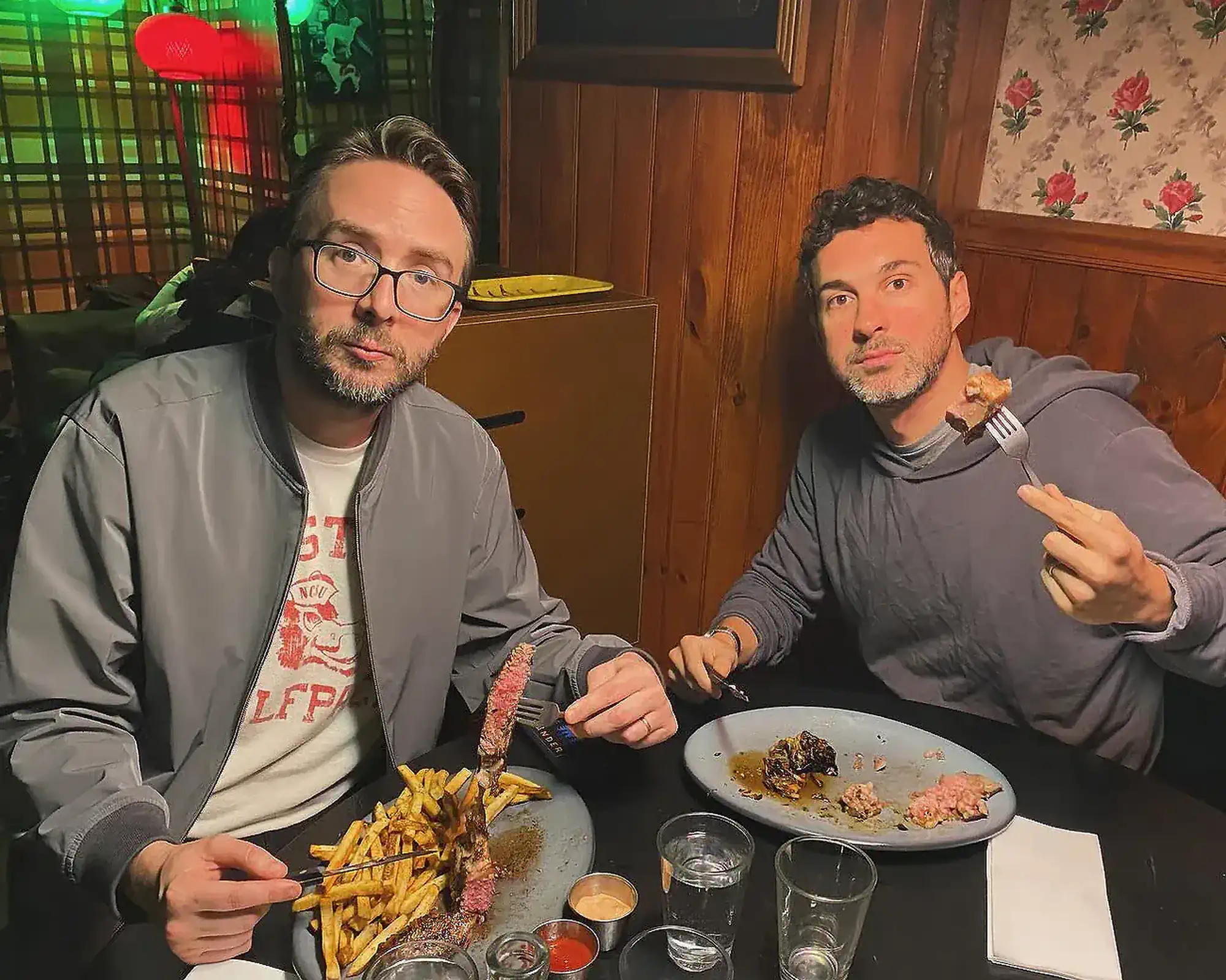 Mark and Joe Eating Steak and Fries | Mark Normand and Joe List | Tuesdays with Stories Comedians Mark Normand and Joe List of Tuesdays with Stories eating steaks and fries. Find more Tuesdays with Stories photos at www.tuesdayspod.com/photos